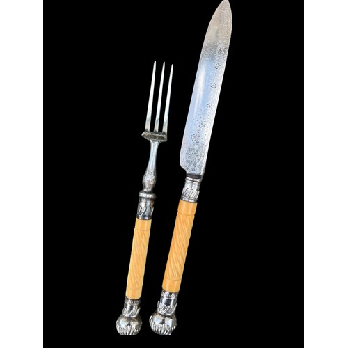 654 - AN ORNATE BONE HANDLED CANTEEN CUTLERY IN MAHOGANY CANTEEN