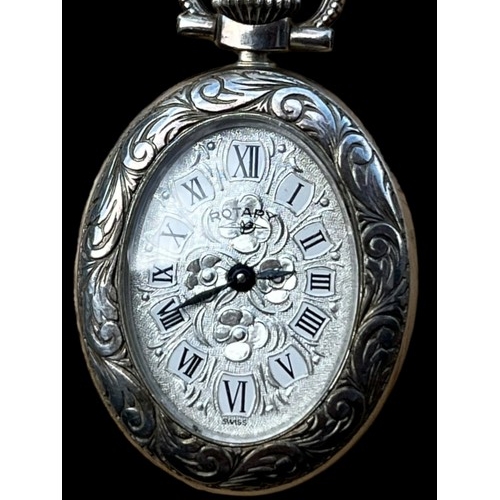 480 - ORNATE SILVER ROTARY WATCH ON A LONG SILVER CHAIN