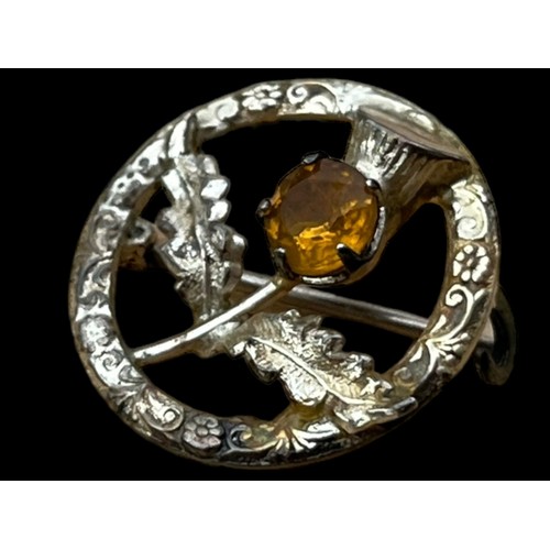 477A - A SILVER CELTIC BROOCH SET WITH CITRINE