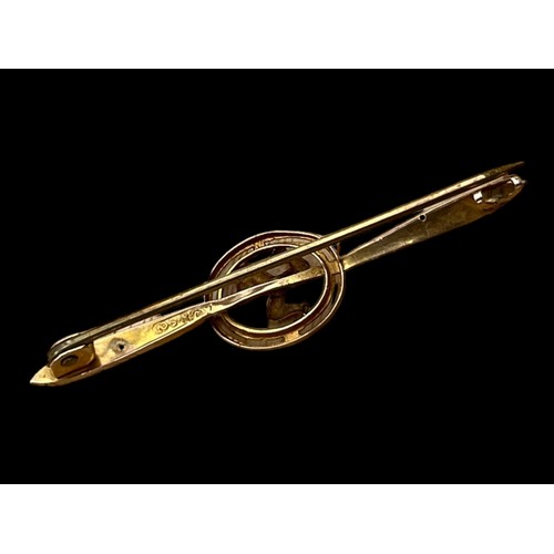 578A - A 9ct GOLD ISLE OF MAN BROOCH