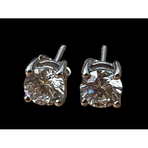 551A - A  PAIR OF LARGE SILVER SOLITAIRE EARRINGS