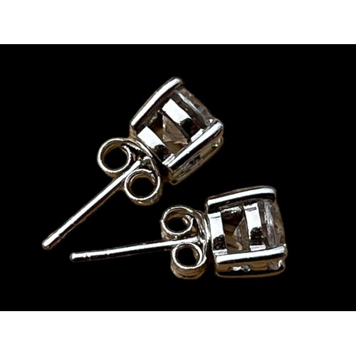 551A - A  PAIR OF LARGE SILVER SOLITAIRE EARRINGS