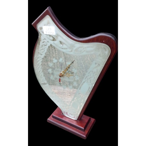 43 - A FREE STANDING IRISH HARP MIRRORED CLOCK