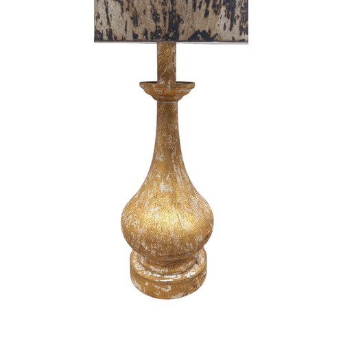 44 - A GILT DISTRESSED TABLE LAMP WITH MATCHING SHADE 24