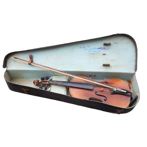 48 - A VIOLIN IN CASE NEEDS RESTRUNG