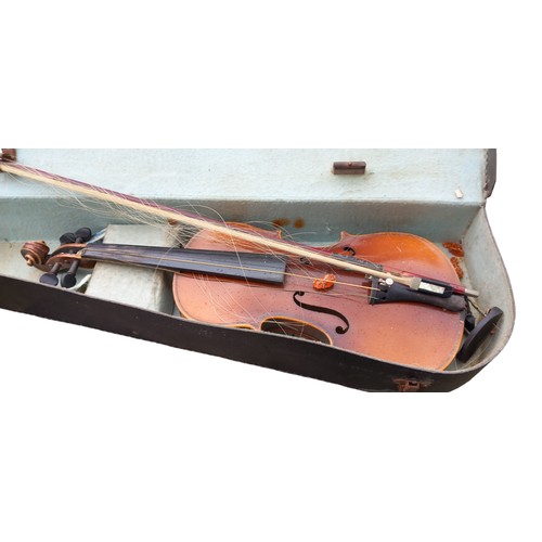 48 - A VIOLIN IN CASE NEEDS RESTRUNG