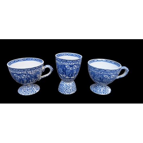 19 - 2 ANTIQUE POTTERY WILLOW PATTERN CUPS AND LARGE EGG CUP