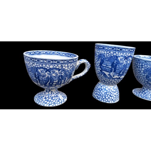 19 - 2 ANTIQUE POTTERY WILLOW PATTERN CUPS AND LARGE EGG CUP