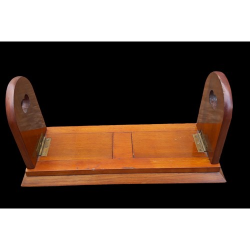 22 - AN EXTENDABLE MAHOGANY BOOK STAND