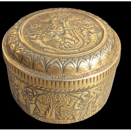 23 - A VINTAGE  EMBOSSED BRASS POT WITH INDIAN SCENES 7x4