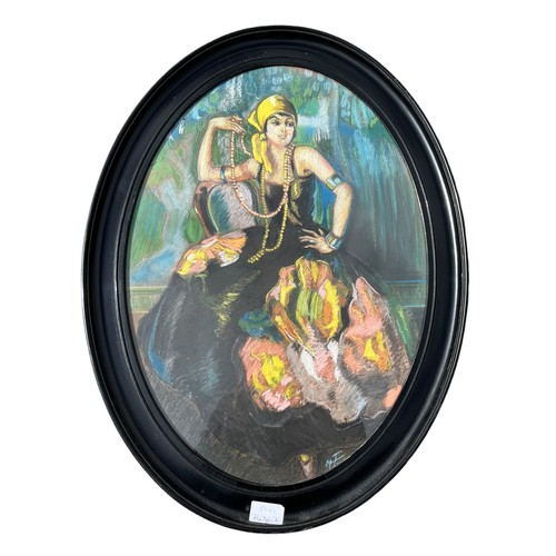 57 - AN OVAL EBONY  FRAMED PASTAL OF FLAMENC DANCER SIGNED