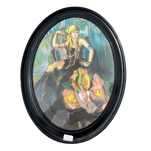 57 - AN OVAL EBONY  FRAMED PASTAL OF FLAMENC DANCER SIGNED