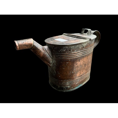 119 - A SMALL VINTAGE WATERING CAN