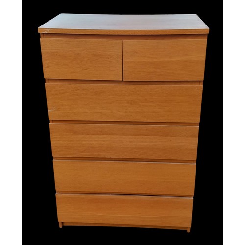 122 - A 2 OVER 4 OAK CHEST OF DRAWERS