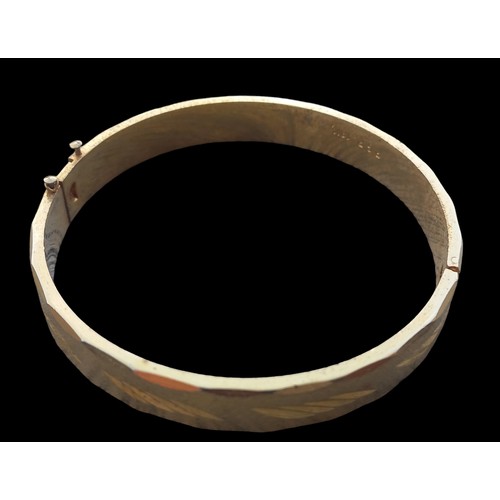 172 - 18CT ROLLED GOLD BANGLE