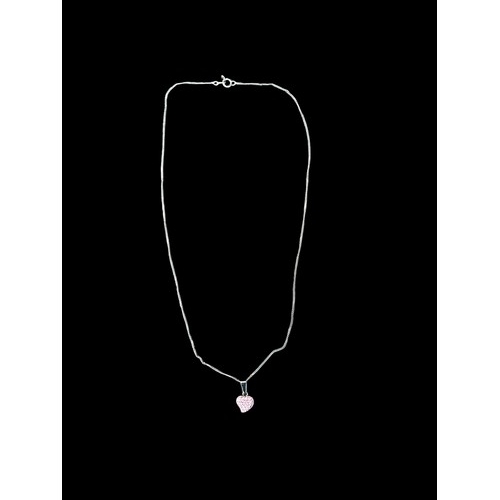 175 - A SILVER HEART GEM SET PENDANT ON A SILVER CHAIN