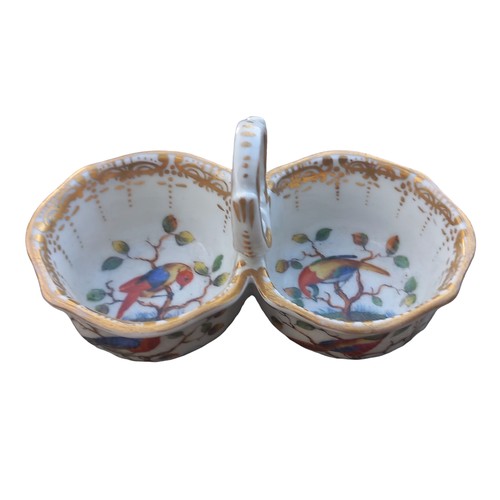 179 - A MISSEN DOUBLE SALT WITH LOOP HANDLE DECORATED WITH BIRDS