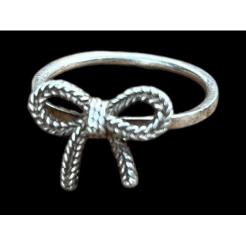 181 - A SILVER BOW RING