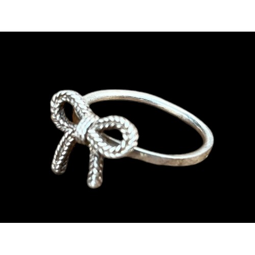 181 - A SILVER BOW RING