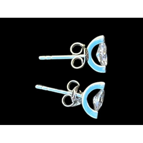 188 - A PAIR OF SILVER SOLITAIRE EARRINGS