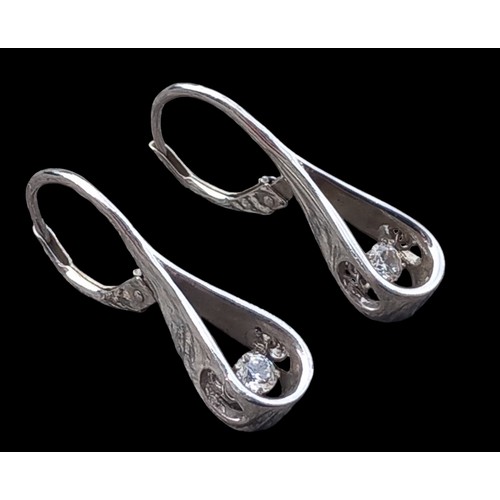 205 - A PAIR OF DROP DESIGNER SILVER SOLITAIRE EARRINGS