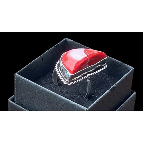 206 - A SILVER 1/2 MOUNT SEMI PRECIOUS RED STONE RING