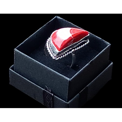 206 - A SILVER 1/2 MOUNT SEMI PRECIOUS RED STONE RING