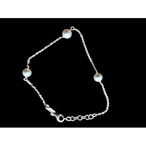 222 - A SILVER AND PEARL BRACELET