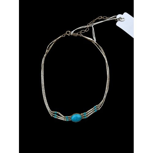 184 - A SILVER AND TURQUOISE CHOKER