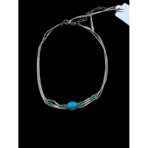 184 - A SILVER AND TURQUOISE CHOKER