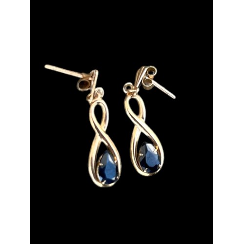 245 - A PAIR OF 9ct  GOLD EARRINGS SET WITH SAPPHIRES