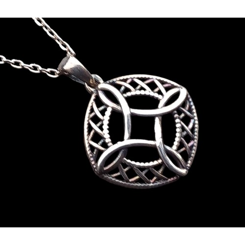 246 - A SILVER CELTIC DESIGN FOB ON A SILVER CHAIN