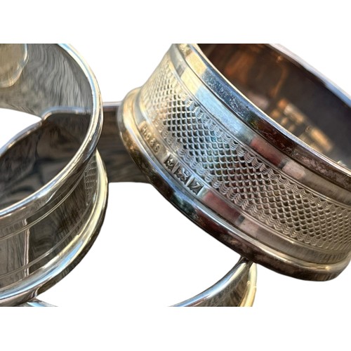 249 - A MATCHING SET OF 4 SILVER NAPKIN RINGS