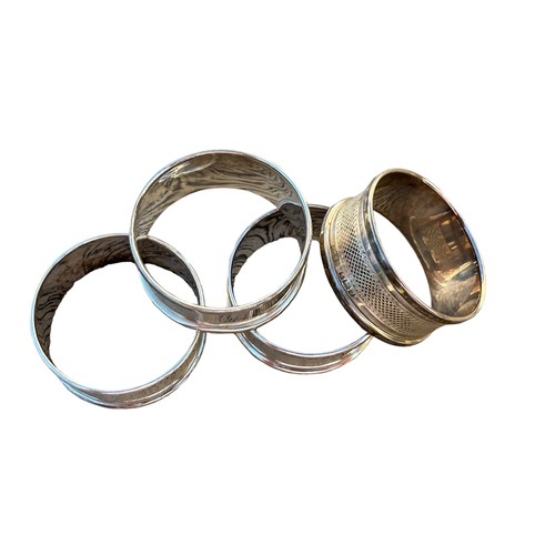 249 - A MATCHING SET OF 4 SILVER NAPKIN RINGS