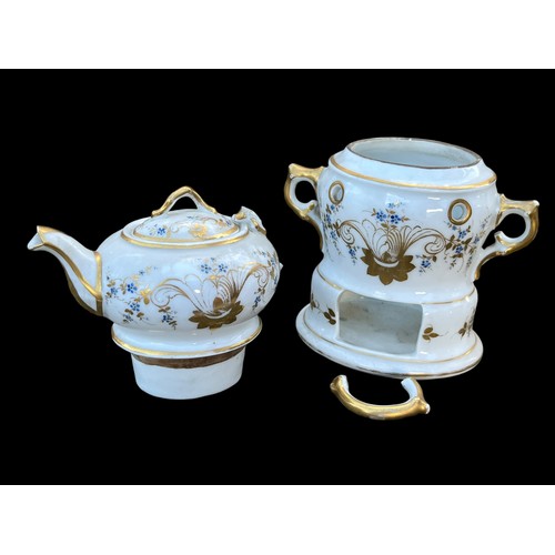 297 - A HAND PAINTED GILDED BACHELORS  TEAPOT ON BASE