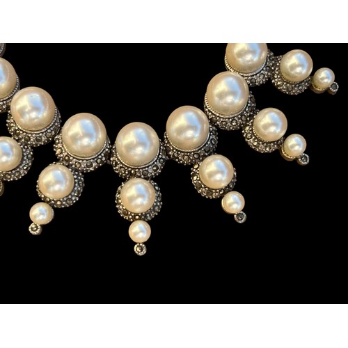 259 - A HEAVY SILVER MARCASITE AND PEARL BRACELET