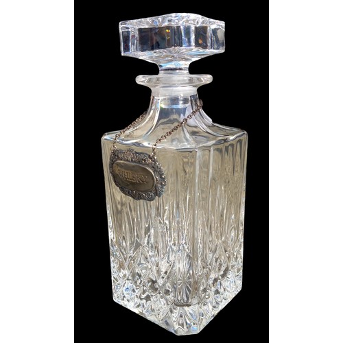 308 - A CRYSTAL WHISKY DECANTER WITH LABEL