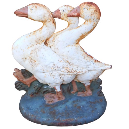 319 - A CAST IRON GOOSE DOOR STOP