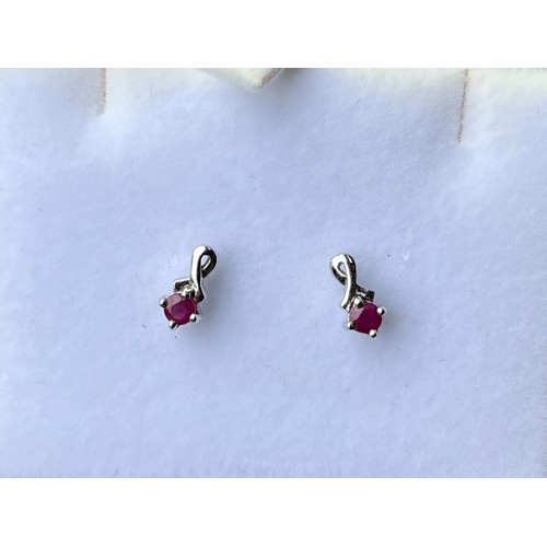 270 - A PAIR OF SILVER RUBY EARRINGS