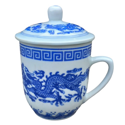 388 - A LARGE CHINESE TEACUP WITH LID AND MARKINGS DECORATED WITH A DRAGON