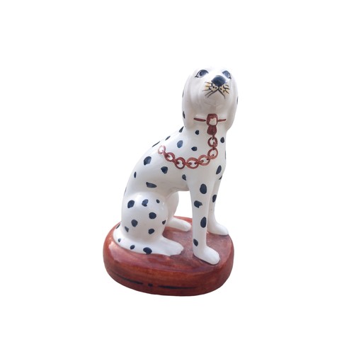 322 - 2 SMALL DALMATION POTTERY DOGS