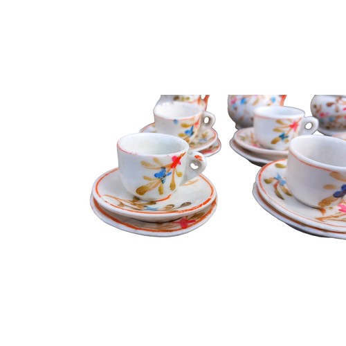 395 - A VINTAGE DOLLS TEA SERVICE