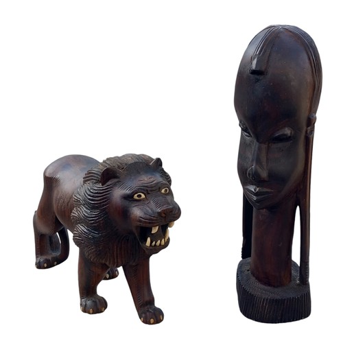 397 - 2 PIECE OF AFRICAN HARDWOOD CARVINGS A LION AND A LADY FIGURE