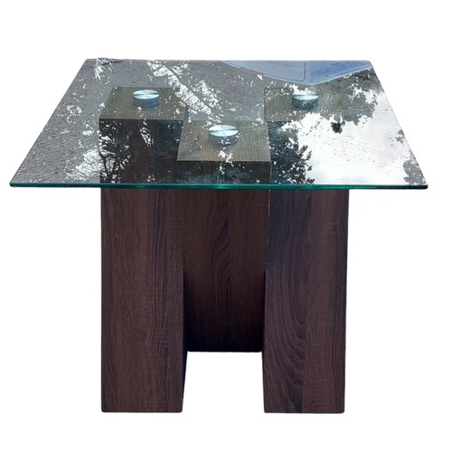 401 - A DESIGNER WALNUT CROSSED FRAMED LAMP TABLE WITH A GLASS TOP