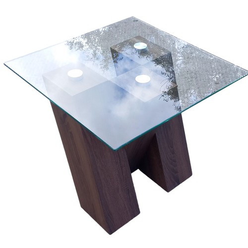 401 - A DESIGNER WALNUT CROSSED FRAMED LAMP TABLE WITH A GLASS TOP