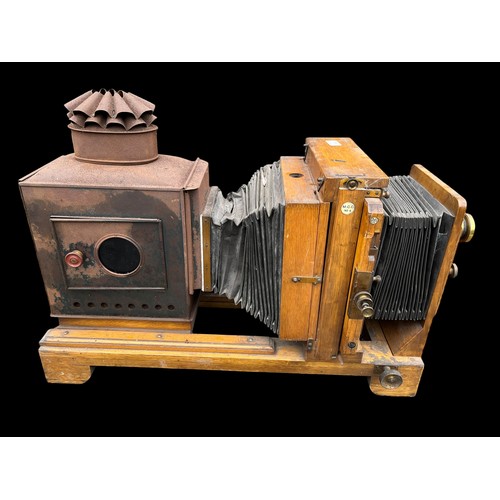 411 - AN ANTIQUE MAGIC LANTERN