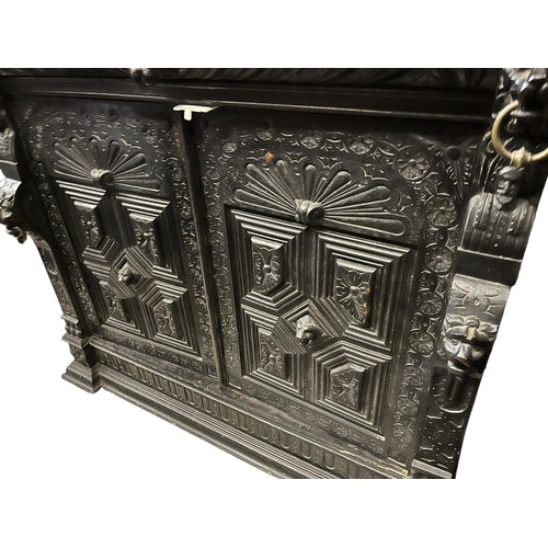 474 - A STUNNING ANTIQUE HEAVILY CARVED TALL IRISH BOOKCASE WITH STAINED GLASS PANELS DECORATIVLY CARVED W... 