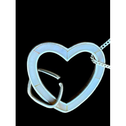 485 - A LARGE HEAVY SILVER & M.O.P HEART PENDANT ON A SILVER CHAIN