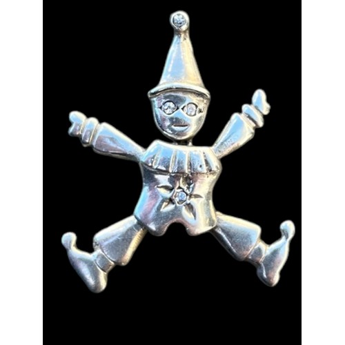 495 - A SILVER ARTICULATED CLOWN PENDANT