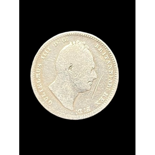 511 - A WILLIAM IV 1834 SILVER SHILLING